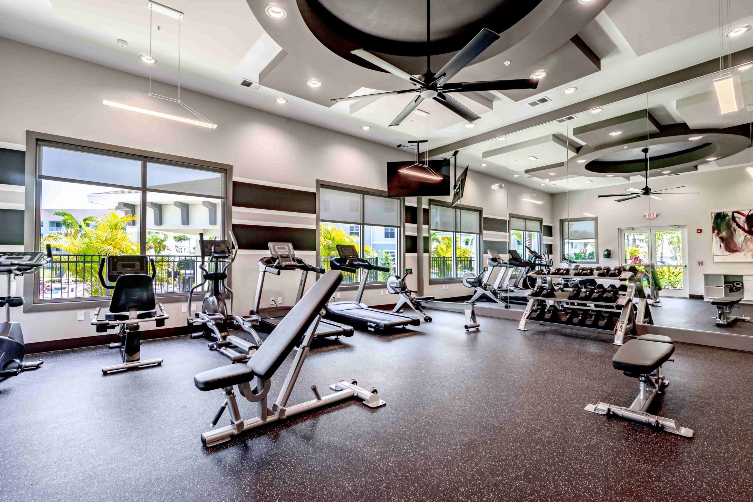 community fitness center with modern equipment and weights